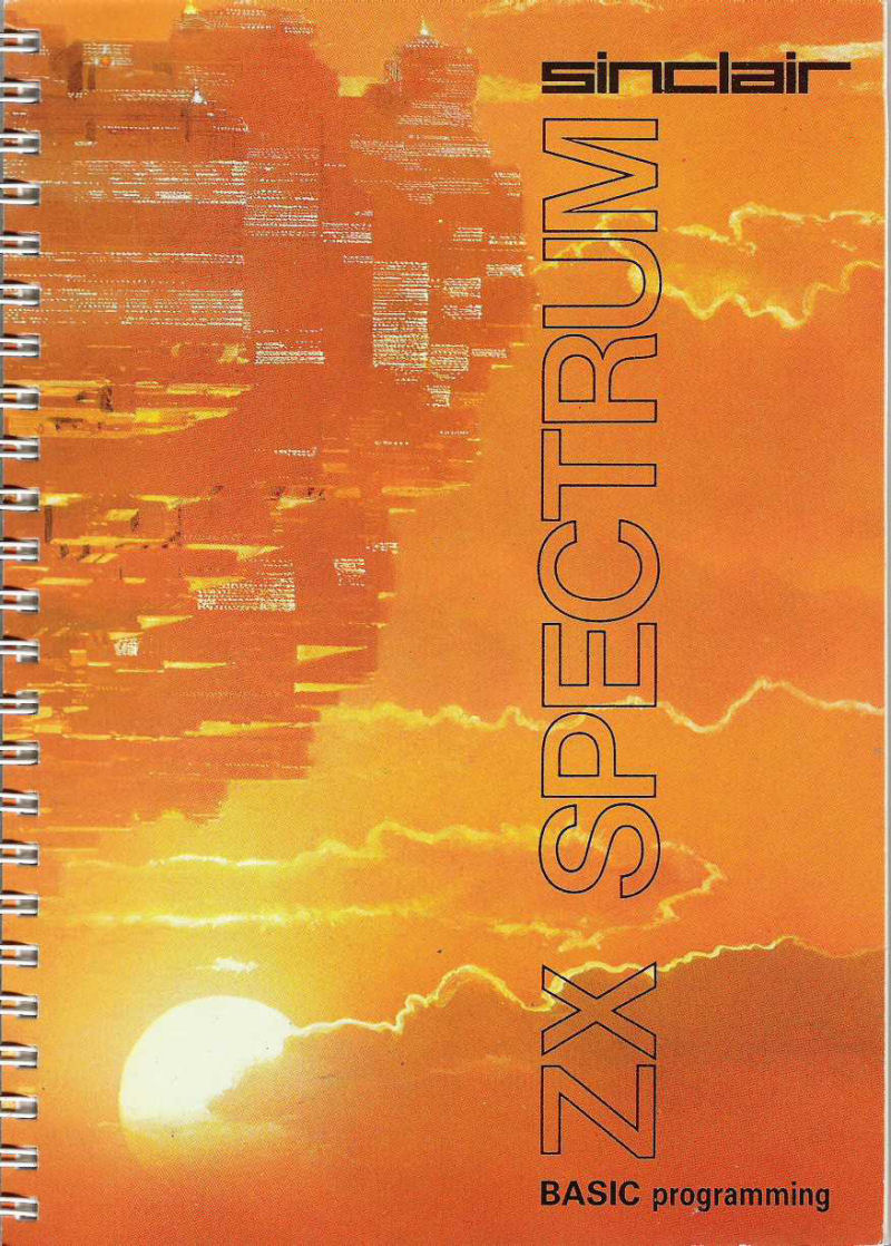 ZX Spectrum BASIC Programming manual - orange sunset cover with spiral binding