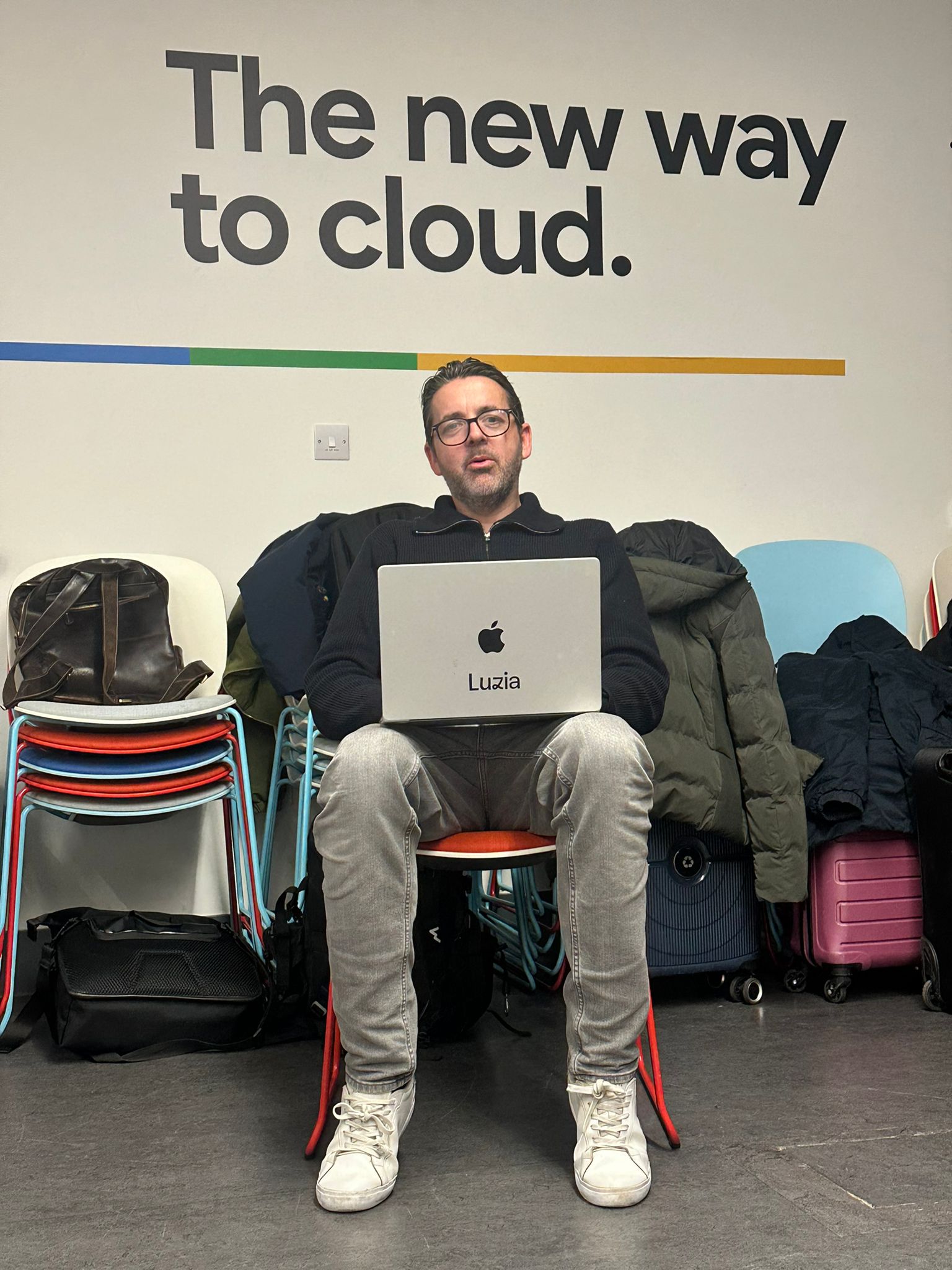 Mark MacMahon coding at Google Cloud office